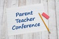 Parent Teacher conference on ruled lined paper with pencil for school