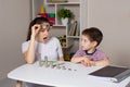 The parent teaches the child how to handle money. Financial literacy course for children of preschool and school age.