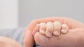 parent& x27;s hands holding newborn baby& x27;s fingers close up of father& x27;s hand holding their newborn baby. Love Royalty Free Stock Photo