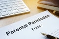 Parental Permission Form on a table.