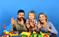 Parenthood and game concept. Man with beard, woman and boy Royalty Free Stock Photo