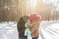 Parenthood, season and people concept - happy family with child in winter clothes outdoors Royalty Free Stock Photo