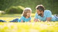 parenting and fatherhood. fathers day. happy cheerful father and son having fun in park Royalty Free Stock Photo