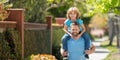 parenting and fatherhood. fathers day. happy father and son having fun outdoor. Royalty Free Stock Photo