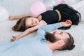 Parenting lifestyle tired father asleep daughter