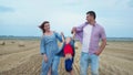 Parenting, mother and father hold their son hands and throw up Royalty Free Stock Photo