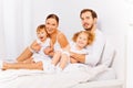 Parents with adorable children in white pajamas Royalty Free Stock Photo