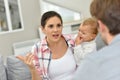 Parents arguing in front of baby