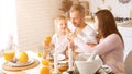 Cheerful family having breakfast together Royalty Free Stock Photo