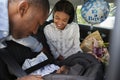 Parents Bringing Newborn Baby Home In Car Royalty Free Stock Photo