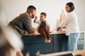 Parents, child and home of a fun, loving and caring family being playful with their son. Funny father making silly faces Royalty Free Stock Photo