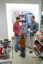 Parents with child in shop