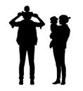 Parents with a child silhouettes