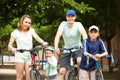 Parents with children with bicycles