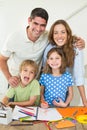 Parents with children drawing at table Royalty Free Stock Photo