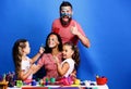 Parents and children painted with gouache on blue background Royalty Free Stock Photo