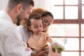 Parents and children relax in the living room of the house Royalty Free Stock Photo