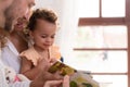 Parents and children relax in the living room of the house. Royalty Free Stock Photo