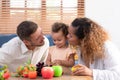 Parents and children relax in the living room of the house. Royalty Free Stock Photo