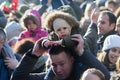 Parents with children on shoulders