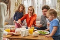 Portrait of smiling family eating at home Royalty Free Stock Photo