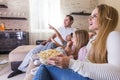 Parents and children watching TV Royalty Free Stock Photo