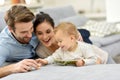 Parents enjoying with baby girl at home Royalty Free Stock Photo