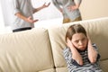 Parents fighting in front of their daughter Royalty Free Stock Photo