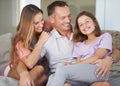 Parents, girl kid and portrait on patio with hug, care and love with dad with smile at family house. Father, mother and