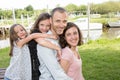 Parents Giving Children daughter girls piggybacks In Countryside Royalty Free Stock Photo