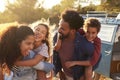 Parents giving their kids piggybacks, waist up Royalty Free Stock Photo