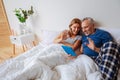 Parents having video chat with their daughter using the laptop Royalty Free Stock Photo