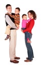 Parents hold children on hands Royalty Free Stock Photo