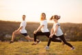 Parents instill sports habits in their child by example, focus on child. Happy sporty family doing stretching exercises, practices