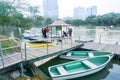 Parents and kid prepare to get in boat and water cycle in public park taken in Lumpini Park Bangkok Thailand Royalty Free Stock Photo