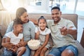 Parents, kids and happy family watching tv, movie and media, tv show and cartoon film in home lounge, living room sofa Royalty Free Stock Photo