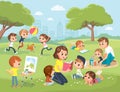 Parents with kids at the park. Mum reading book to children Royalty Free Stock Photo