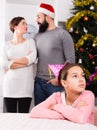 Parents lecturing daughter at Christmas Royalty Free Stock Photo