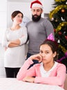 Parents lecturing daughter at Christmas Royalty Free Stock Photo