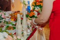 Parents light candles at a wedding. Happy wedding day