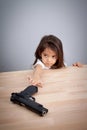 Parents not keep gun in safe place, children can have gun for accident. safety concept Royalty Free Stock Photo