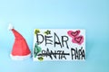 Parents, papa or daddy as real life Santa concept. Christmas letter to Santa Clau