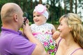Parents play with child on nature Royalty Free Stock Photo