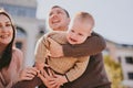 Parents play with their child close-up. Boy flying and laughing, happy family Royalty Free Stock Photo
