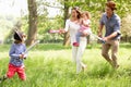 Parents Playing Adventure Game With Children Royalty Free Stock Photo