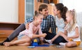 Parents playing lotto with kids Royalty Free Stock Photo