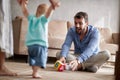 Parents playing with their baby. First steps, family, parenthood Royalty Free Stock Photo