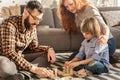 Parents playing with their child Royalty Free Stock Photo