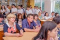 Parents of pupils in class on school meeting.