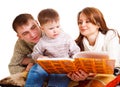 Parents reading to their kid Royalty Free Stock Photo